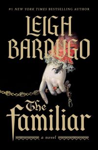 Text says "#1 NEW YORK TIMES BESTSELLING AUTHOR LEIGH BARDUGO THE FAMILIAR a novel". Image of a hand with a beaded red sleeve with lace at the wrist, wearing a red stone ring and holding a rosary. A black scorpion is crawling out of the sleeve.